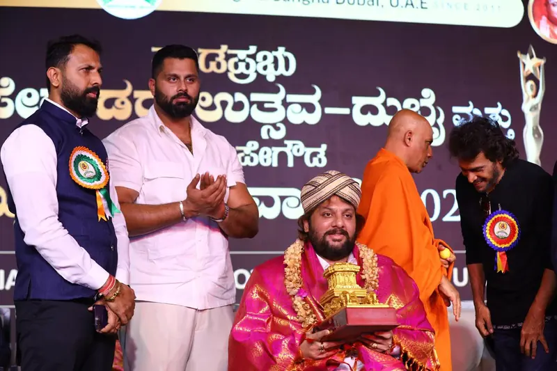 A felicitation on stage at a public event